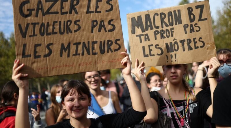 Protesters hold placards during a demonstration by high school and university students supported by teachers, parents' associations, and education labour unions, in Paris as part of a nationwide day of demonstrations and blockades, voicing anger over overcrowded classrooms, teacher shortages and dilapidated school buildings, which students blame on years of underinvestment, France, October 6, 2026. The slogan reads