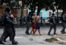Members of the military police special unit detain suspected drug dealers during a police operation against drug trafficking at the favela do Penha, in Rio de Janeiro, Brazil October 28, 2025. REUTERS/Aline Massuca